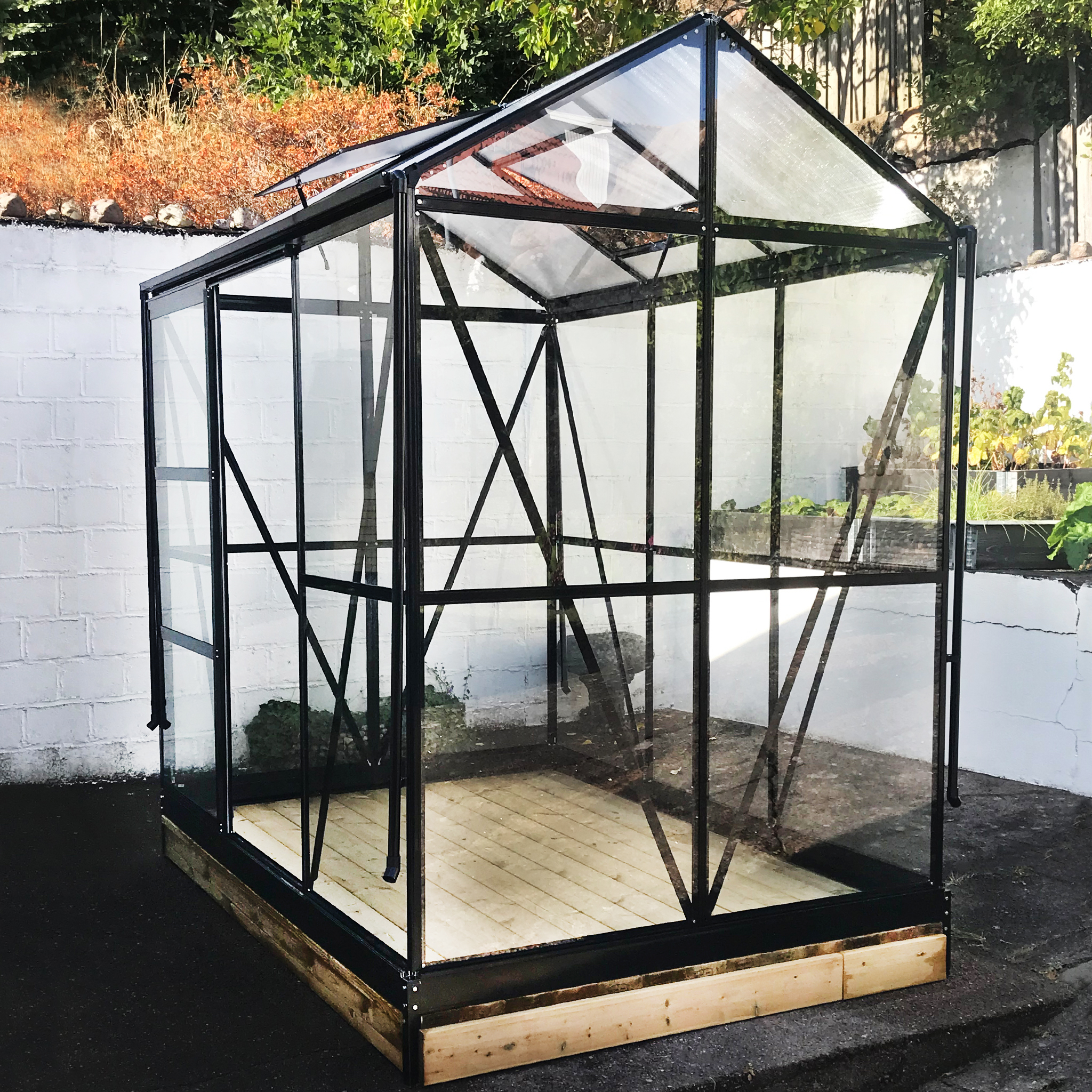 Växthus med adaptiv dörrplacering 3,5m² | 4mm säkerhetsglas | Svart Växthus med adaptiv dörrplacering 3,5m² | 4mm säkerhetsglas | Svart